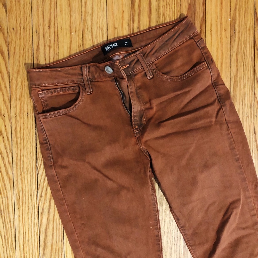 Rust/burnt orange colored skinny jeans